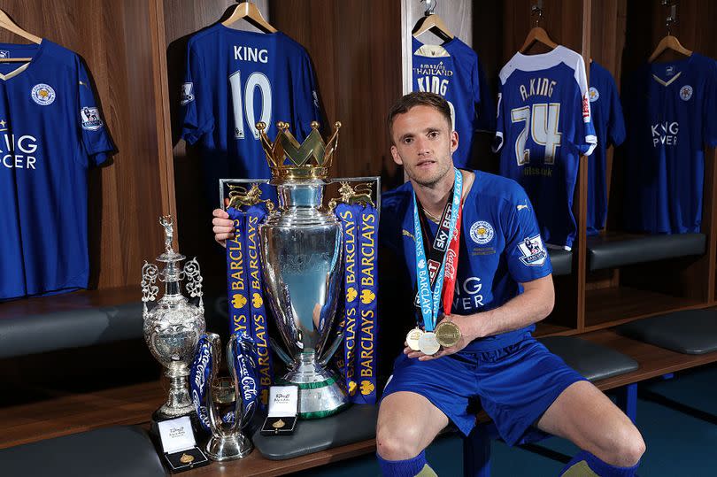 Andy King with the League One, Championship and Premier League trophies - the only player to have won each with the same club in the modern era