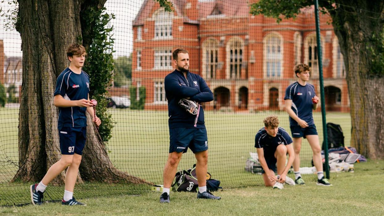 Charlie Thurston and former NCCC player coaching boys at Bedford School