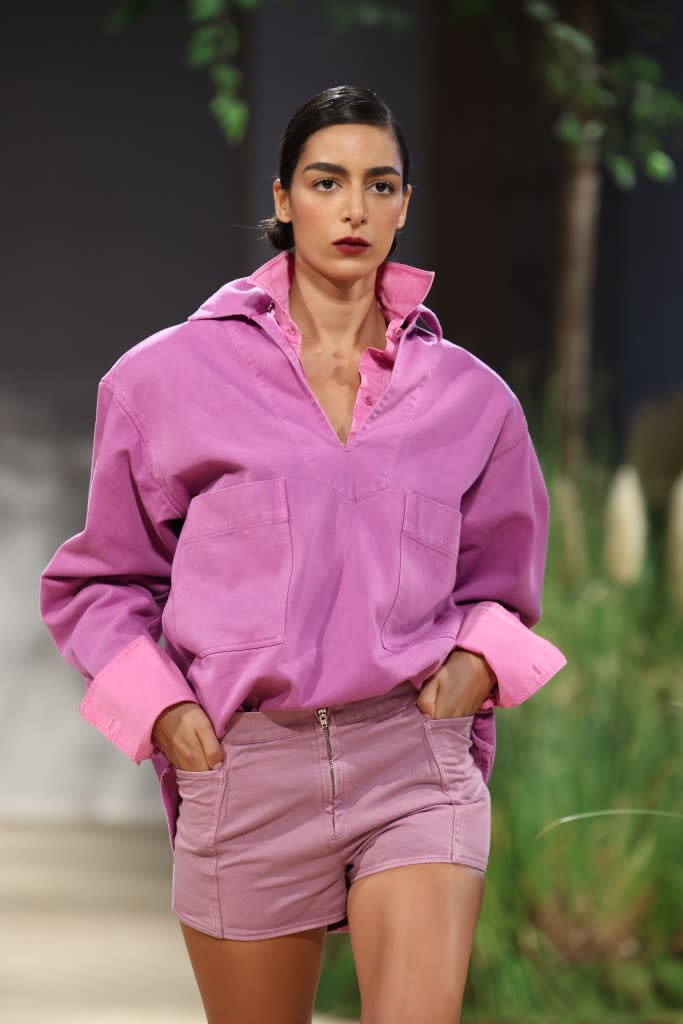 A model walked the Max Mara catwalk in a pair of mauve mini shorts for the spring/summer 2024 collection. WireImage