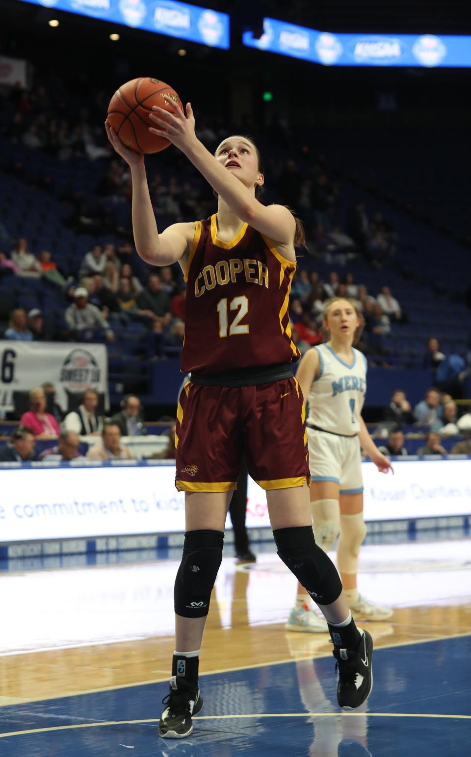 Cooper’s Whitney Lind makes a shot against Mercy in the 2023 Mingua Beef Jerky Girls’ Sweet 16 at Rupp Arena.March 9, 2023