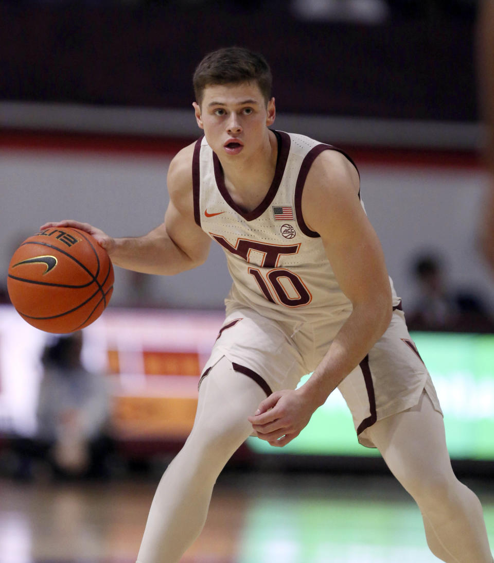 Virginia Tech's Brandon Rechsteiner (10) moves the ball against Campbell during the first half of an NCAA college basketball game Wednesday, Nov. 15, 2023, in Blacksburg, Va. (Matt Gentry/The Roanoke Times via AP)