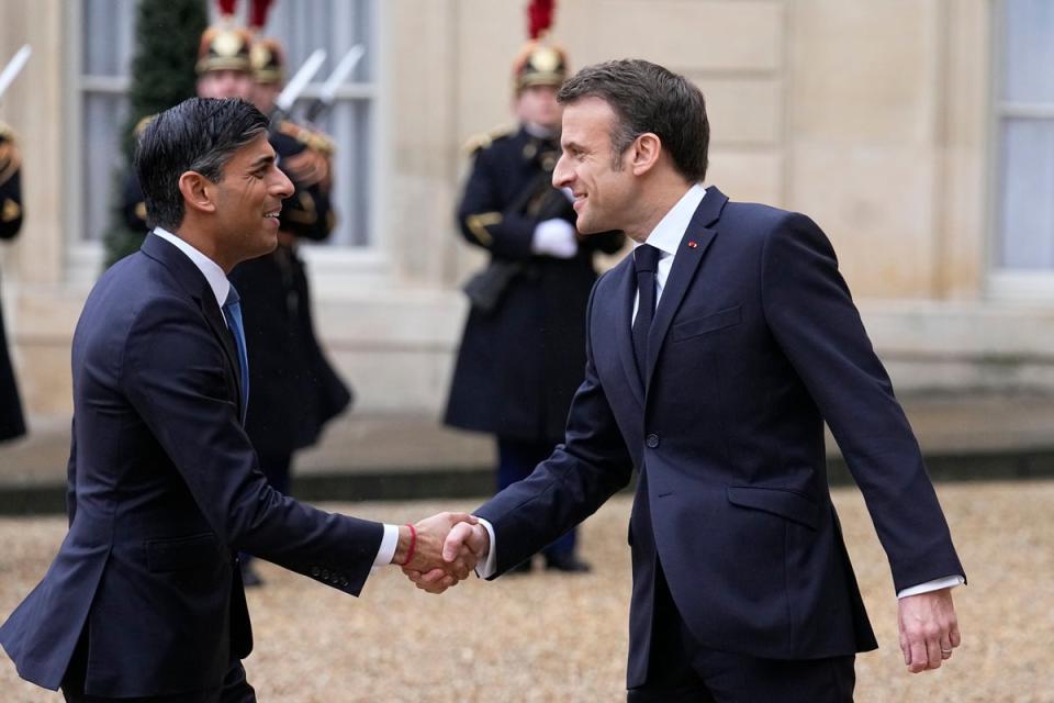 Mr Sunak with French president Emmanuel Macron (AP)