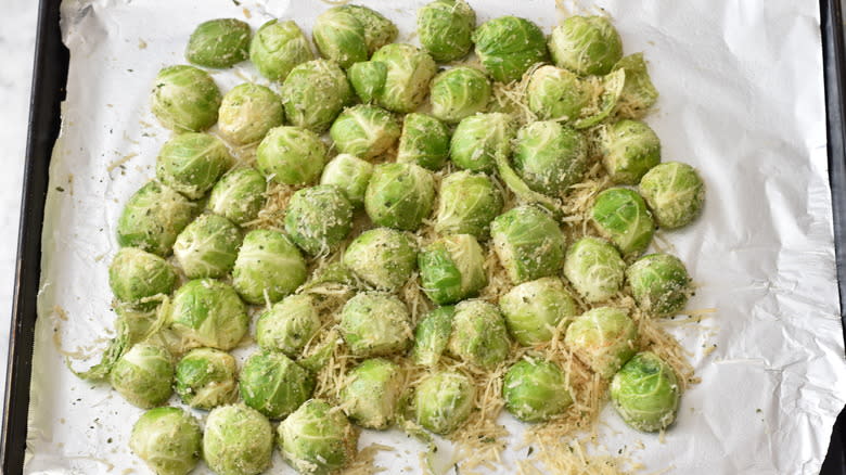 preparing brussels sprouts on pan