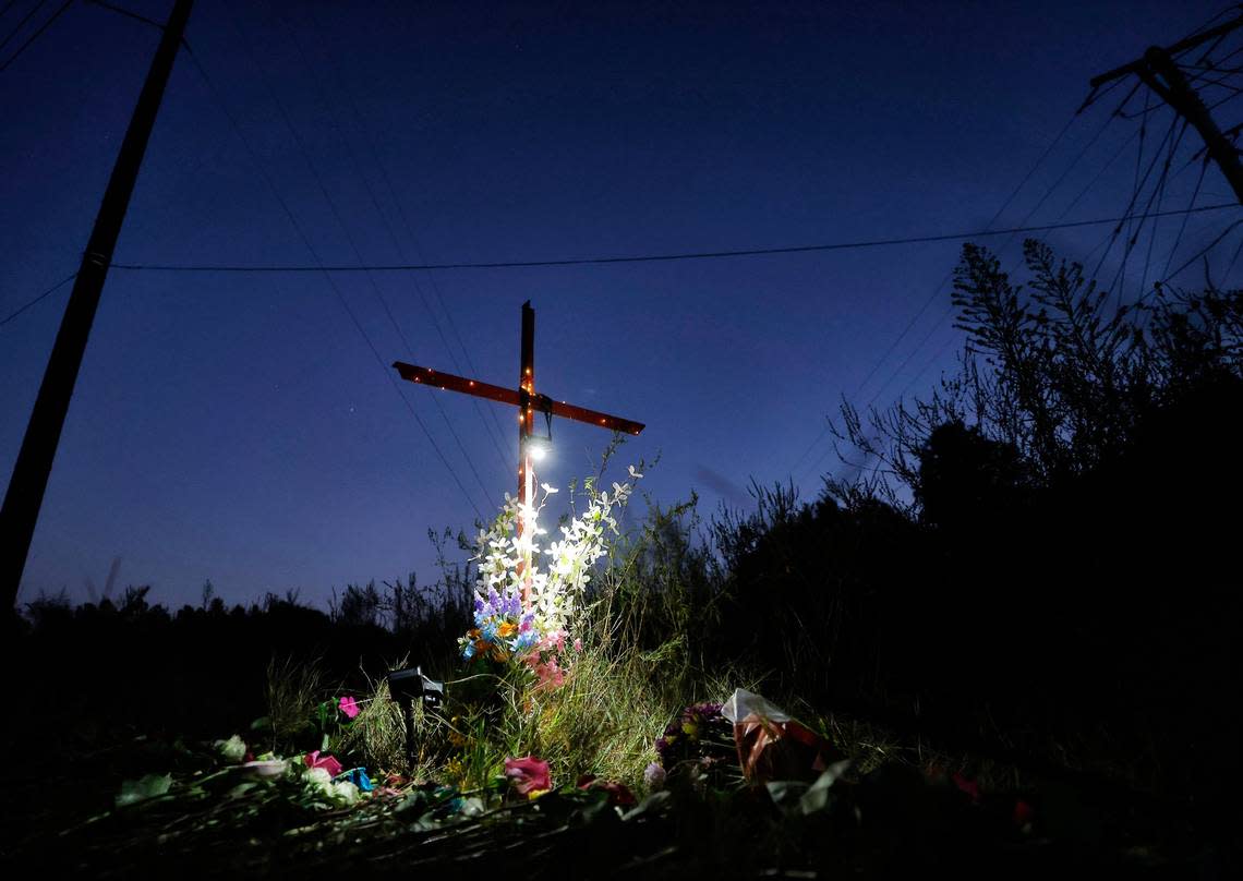 Lights illuminate a memorial for Lyric Woods, 14, and Devin Clark, 18, in Orange County on Tuesday, Sept. 20, 2022. The Orange County Sheriff’s Office said Monday the two young people found shot and killed Sunday in western Orange County are Woods and Clark.