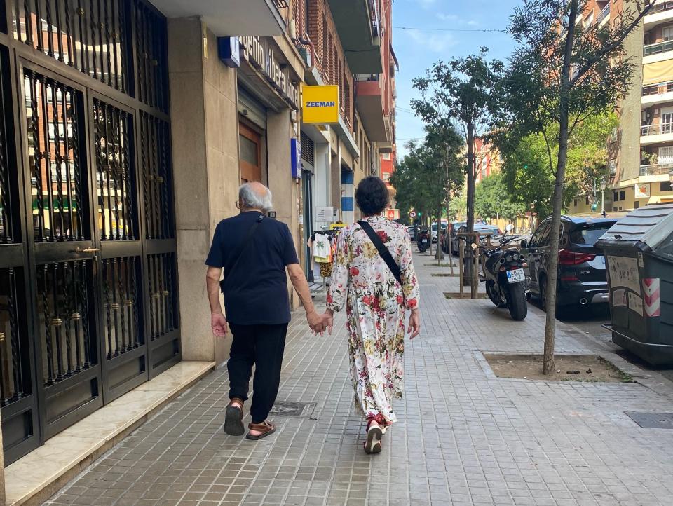 Senior citizens walking in Valencia, Spain