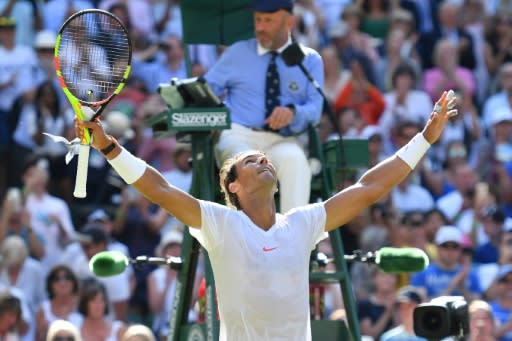 Victory salute: Rafael Nadal celebrates after beating Israel's Dudi Sela 6-3, 6-3, 6-2