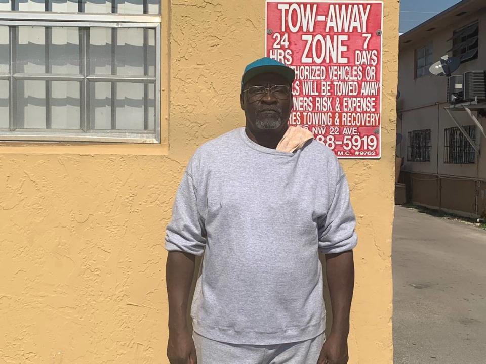Joey Williams stands outside one of the buildings he manages on Northwest 135th Street in Opa-locka on Jan. 21.