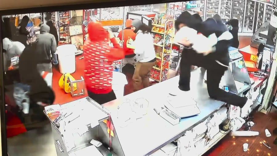 Surveillance video shows a large mob ransacking Ruben’s Bakery & Mexican Food in Compton, California. Jan. 2, 2024.