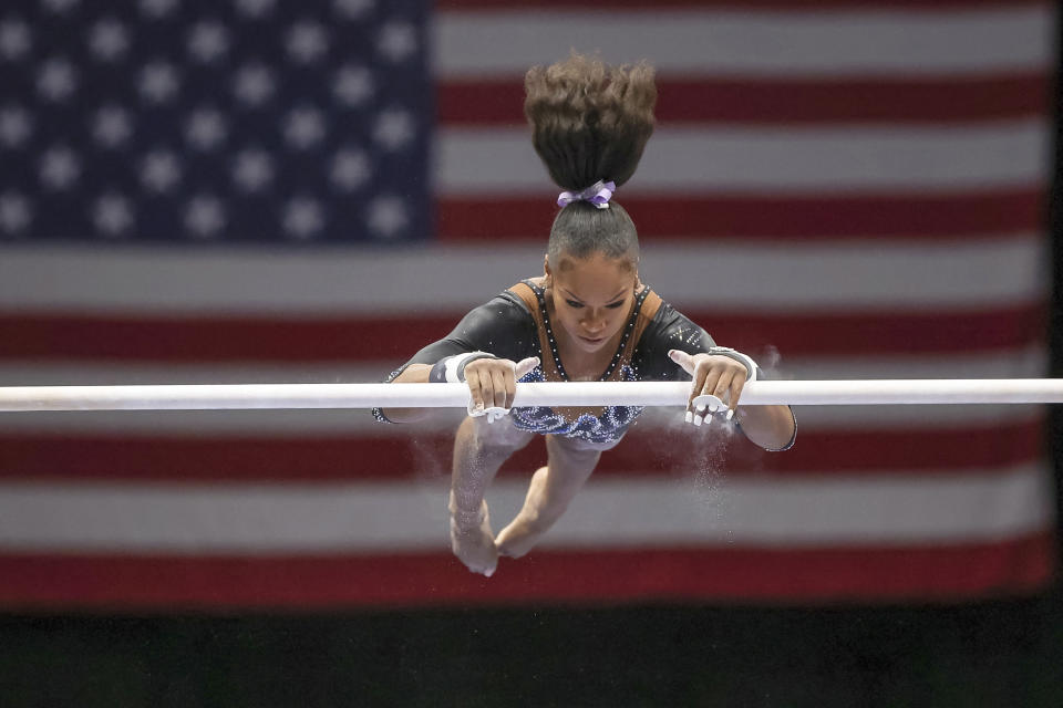 Shilese Jones competes on the uneven bars during the U.S. Gymnastics Championships, Sunday, Aug. 21, 2022, in Tampa, Fla. (AP Photo/Mike Carlson)