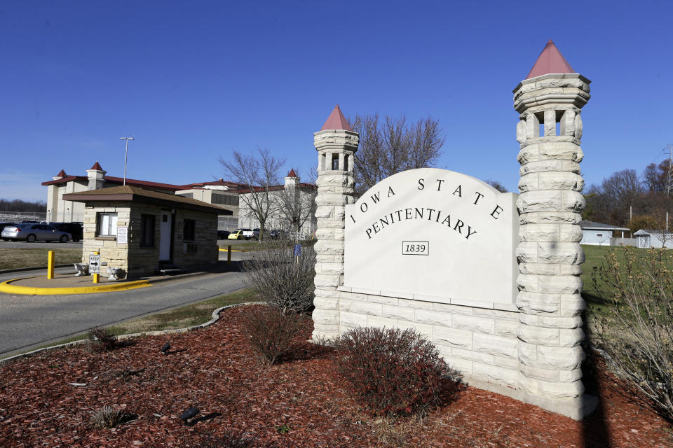 This Nov. 18, 2013 photo, shows sign at the entrance of the Iowa State Penitentiary, in Fort Madison, Iowa. The penitentiary, the oldest in use west of the Mississippi River with a history dating back to 1839, is set to close when a $130 million replacement opens down the road next year. (AP Photo/Charlie Neibergall)