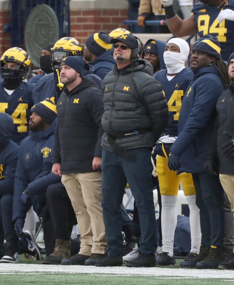 Michigan football head coach Jim Harbaugh on the sidelines against Illinois at Michigan Stadium on Nov. 19, 2022.