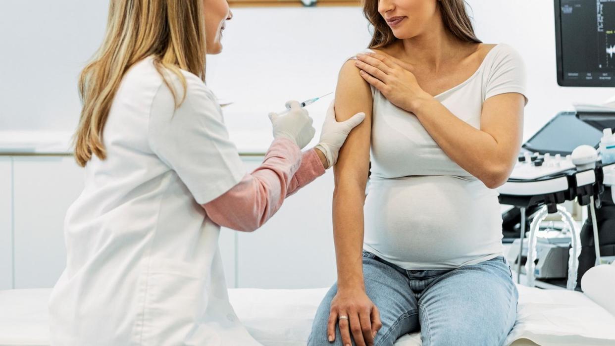 PHOTO: In this undated stock photo, a pregnant woman is seen receiving a vaccine injection. (STOCK PHOTO/Getty Images)