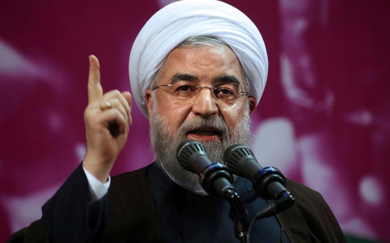 Iranian President Hassan Rouhani  - AP