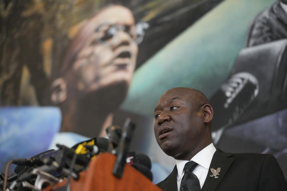 Attorney Ben Crump speaks in front of a mural of Malcolm X during a news conference at the Malcolm X & Dr. Betty Shabazz Memorial and Educational Center in New York, Tuesday, Feb. 21, 2023. Some of Malcom X's family members and their attorneys announced their intent to sue governmental agencies for Malcom X's assassination and the fraudulent concealment of evidence surrounding the murder. In 1965, the minister and civil rights activist was shot to death inside Harlem's Audubon Ballroom in New York. (AP Photo/Seth Wenig)