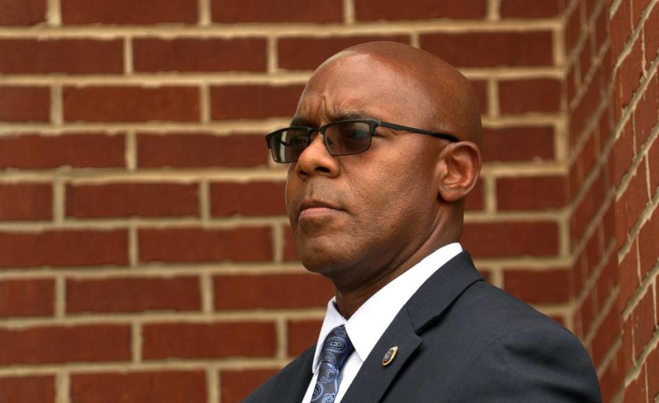 Columbus Police Chief Freddie Blackmon listens to a speaker during a Tuesday evening rally outside the City Services Center prior to Tuesday night’s Columbus Council meeting. 03/28/2023