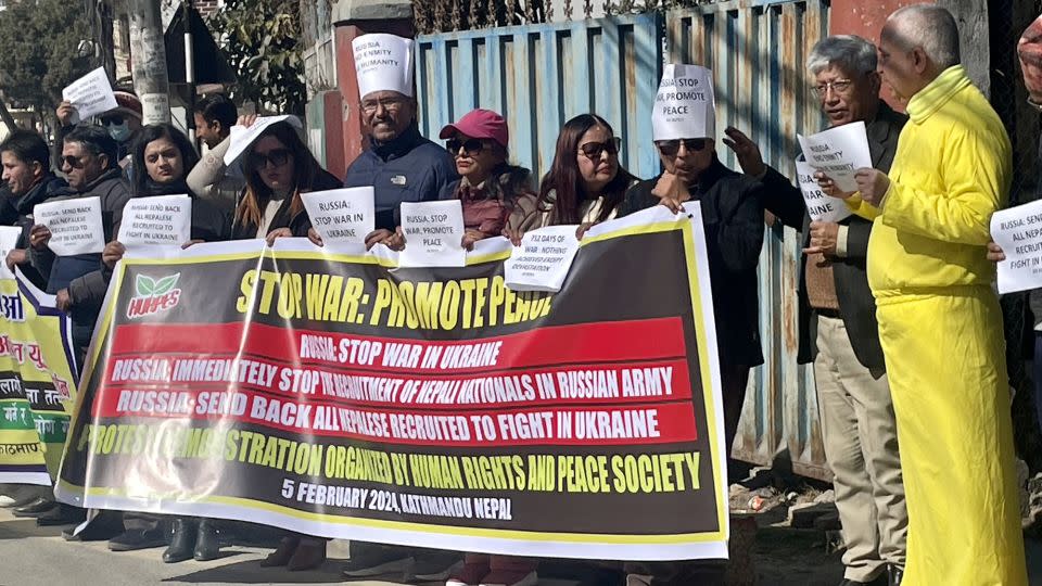 A protest is held near the Russian embassy in Kathmandu by a human rights group. - CNN