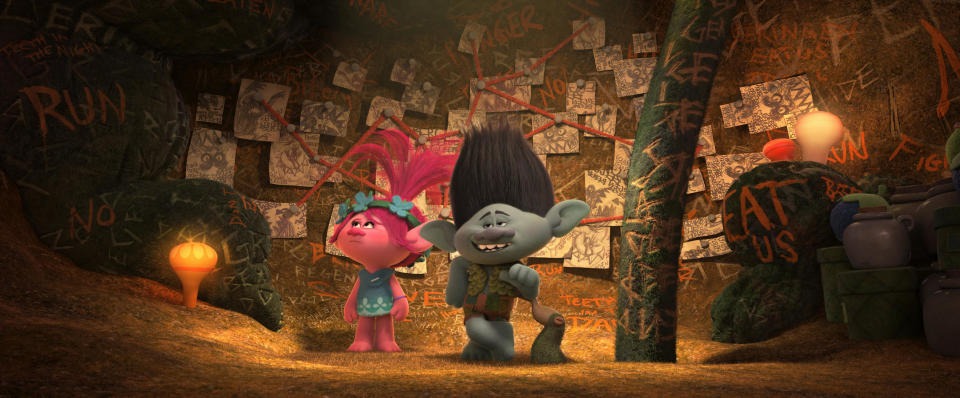 The overly cautious Troll Branch (R, voiced by Justin Timberlake) shows off his Fear Bunker to optimistic Troll Poppy (L, voiced by Anna Kendrick) in DreamWorks Animation's TROLLS.