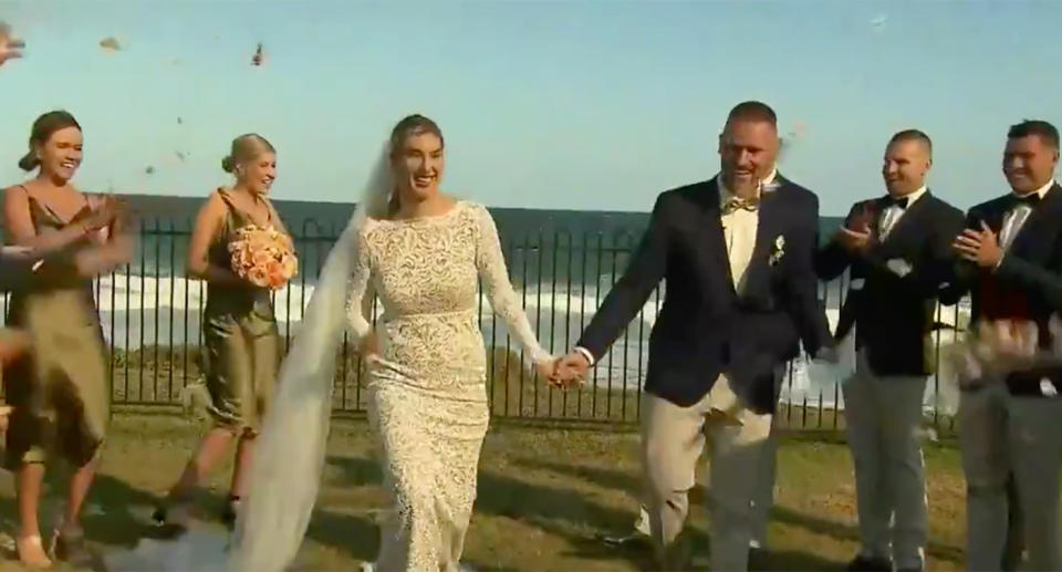 Lucy and Jeremy are pictured just moments after getting married at the new location.