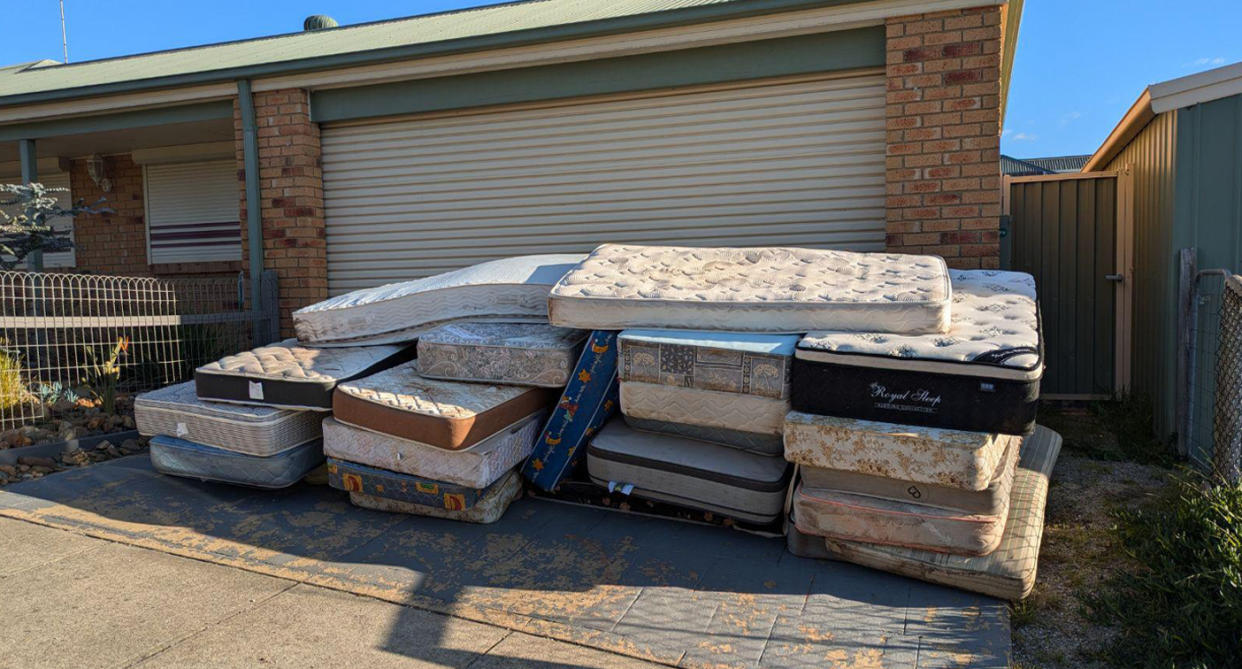 Laura Maultby had 26 mattresses dumped on her Melbourne property by Junk.com.au this week after she didn't pay an invoice. Source: TikTok and Reddit 
