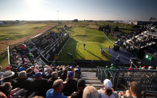 England’s Richard Bland hits the opening shot in the 149th Open Championship at Royal St George's