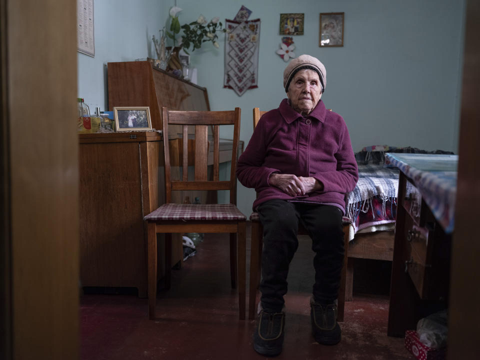 Valentyna Yeremenko, 95, sits in her daughter's home while waiting for the return of her husband Mykola in Bucha, Kyiv region, on Feb. 11, 2024. Mykola Yeremenko, 96, a veteran of World War II, went missing during the Russian occupation of Irpin, Kyiv region on March 19, 2022. Valentyna, who celebrated their 70-year wedding anniversary with Mykola just a few years ago, longs for his return. "We haven't heard anything about Mykola, only the tear-off calendar on the wall remains, and March 19 is the last day a leaf was torn off… that's when he vanished," said Valentyna's daughter Liudmila Yeremenko reflecting on his disappearance. This is not the only tragedy in Valentyna's family. During the Russian occupation in March 2022, a sniper killed her granddaughter Tetiana Yeremenko. She was 47 years old. (AP Photo/Evgeniy Maloletka)