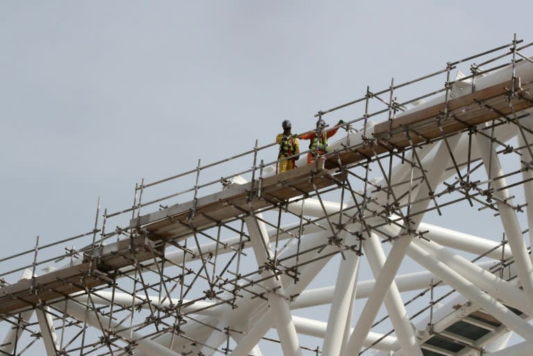 Construction workers are seen at the Al-Wakrah Stadium in Qatar on February 06, 2018