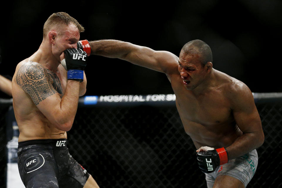 SUNRISE, FLORIDA - APRIL 27:  Ronaldo Souza of Brazil punches Jack Hermansson of Sweden during their middleweight bout at UFC Fight Night at BB&T Center on April 27, 2019 in Sunrise, Florida. (Photo by Michael Reaves/Getty Images)