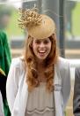 <p>A very young Princess Beatrice donned a cheerful gold fascinator at the Ascot Racecourse.</p>