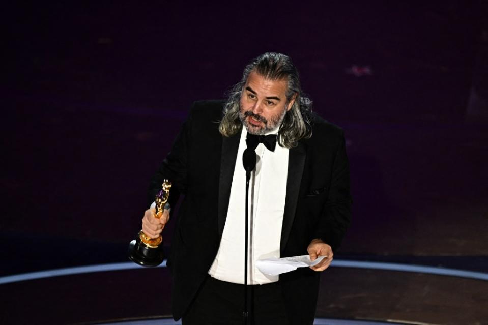Dutch-Swedish cinematographer Hoyte van Hoytema accepted the award for Best Cinematography for “Oppenheimer” onstage during the 96th Annual Academy Awards. PATRICK T. FALLON/AFP via Getty Images