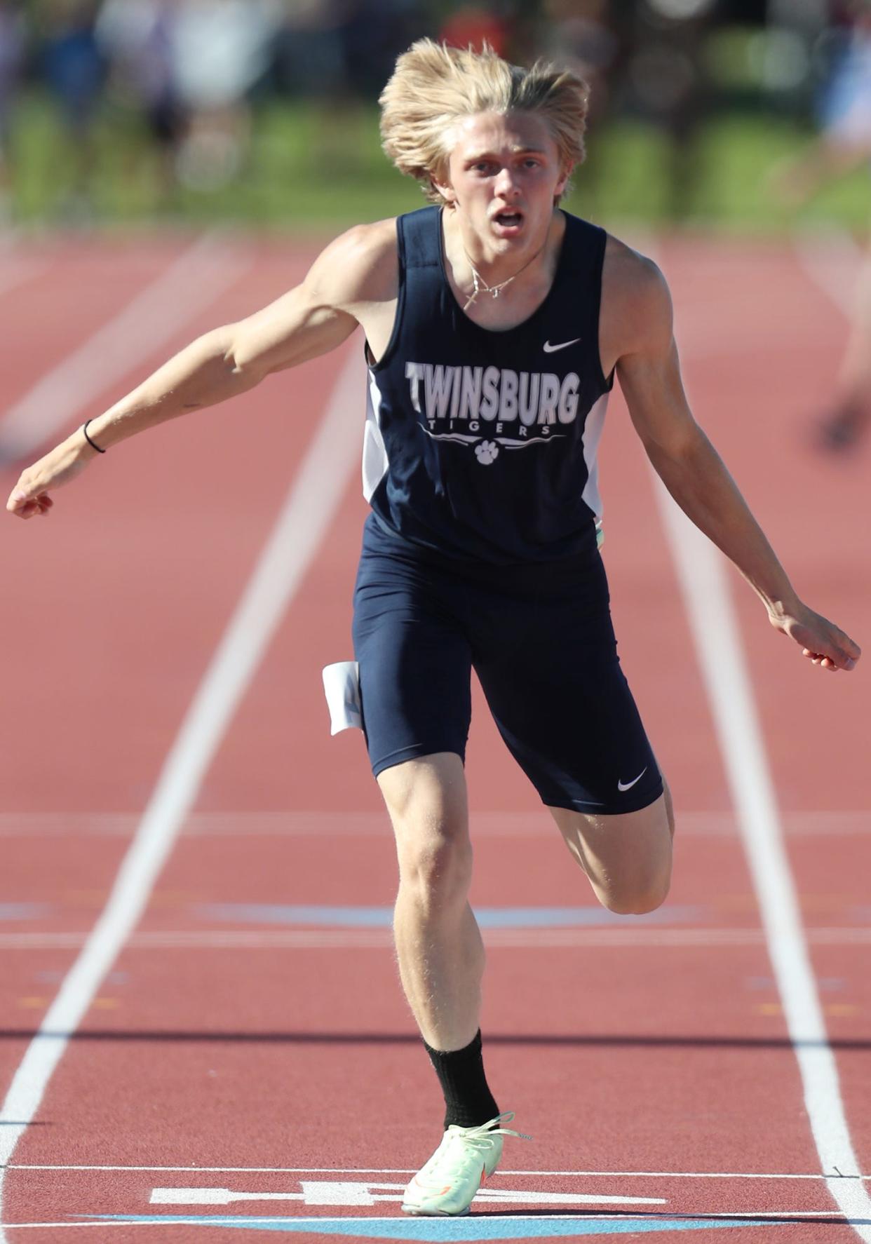Twinsburg's Logan Doyle crosses the finish line for a second place finish in the boys 400 meter dash at the Div. I state track and field championships at Jesse Owen Stadium in Columbus on Saturday.
