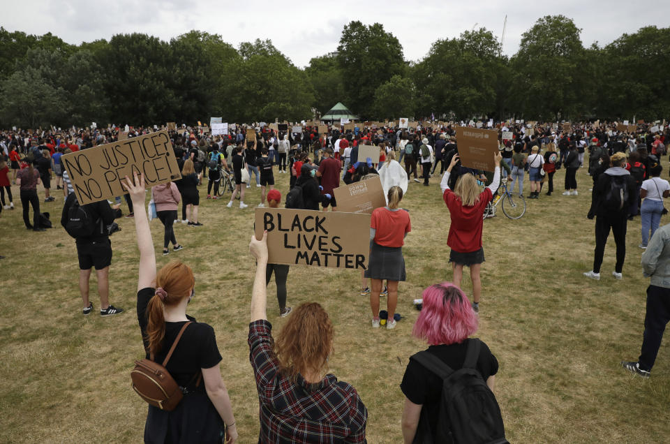 Protesters take part in a demonstration on Wednesday, June 3, 2020, in Hyde Park, London, over the death of George Floyd, a black man who died after being restrained by Minneapolis police officers on May 25. Protests have taken place across America and internationally, after a white Minneapolis police officer pressed his knee against Floyd's neck while the handcuffed black man called out that he couldn't breathe. The officer, Derek Chauvin, has been fired and charged with murder. (AP Photo/Matt Dunham)