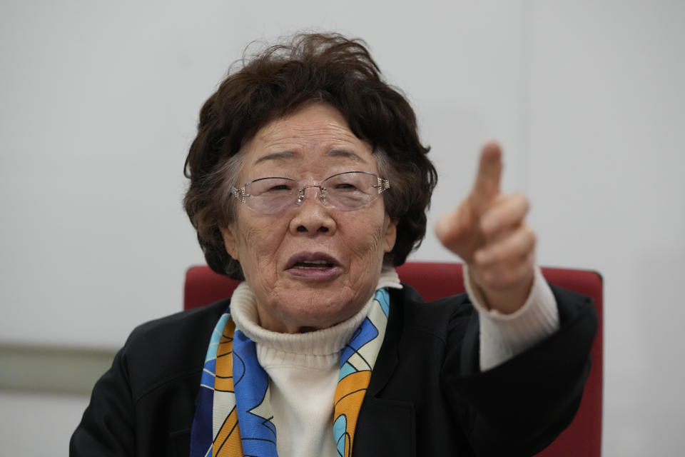 Lee Yong-soo, a South Korean sexual slavery survivor who has been demanding since the early 1990s that the Japanese government fully accept culpability and offer an unequivocal apology, speaks during an interview in Seoul, South Korea, Wednesday, March 16, 2022. (AP Photo/Lee Jin-man)