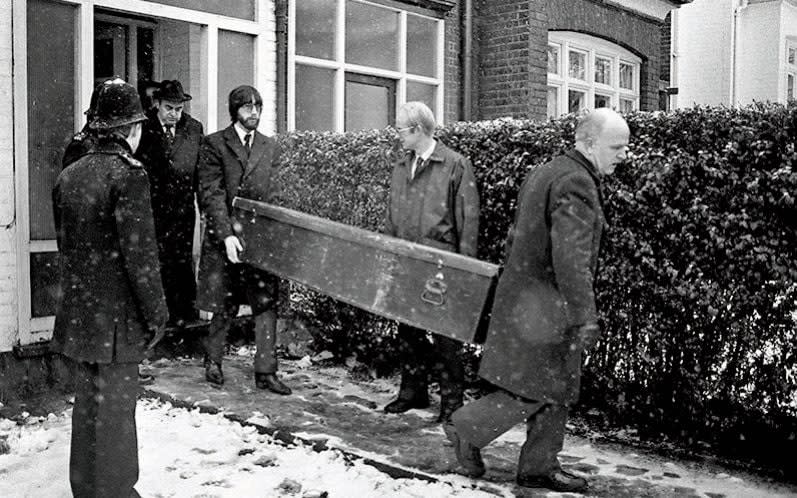  A coffin being taken from Cranley Gardens  - PA