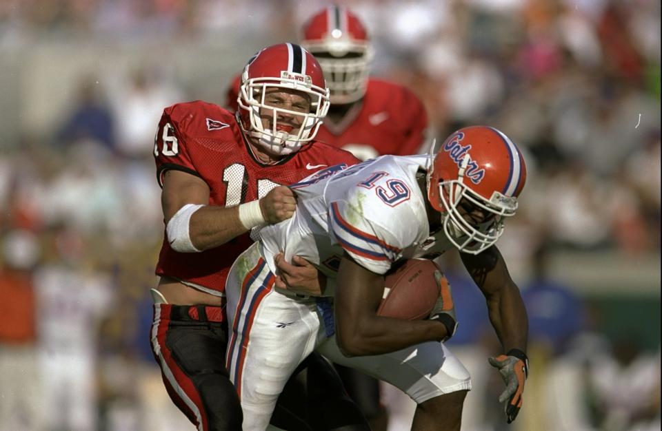 Kirby Smart (L) had 13 interceptions as a player for the Bulldogs. Now he’s coaching them in the national title game. (Getty)