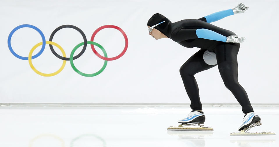 Brittany Bowe of the U.S. competes in the women's 1,500-meter speedskating race at the Adler Arena Skating Center during the 2014 Winter Olympics in Sochi, Russia, Sunday, Feb. 16, 2014. (AP Photo/Pavel Golovkin)