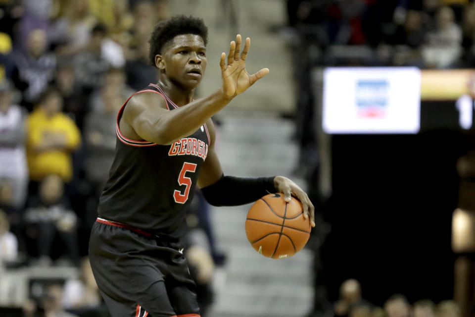 Georgia's Anthony Edwards dribbles while gesturing to teammates during the first half of an NCAA college basketball game against Missouri on Tuesday, Jan. 28, 2020, in Columbia, Mo. (AP Photo/Jeff Roberson)