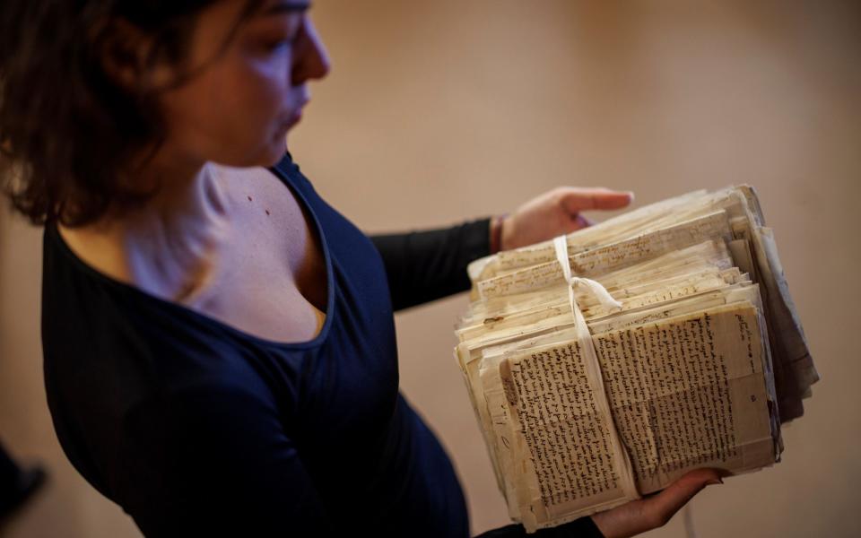 A researcher displays seized letters from Sephardic Jews diaspora in 1702 from The Spanish Prize Papers