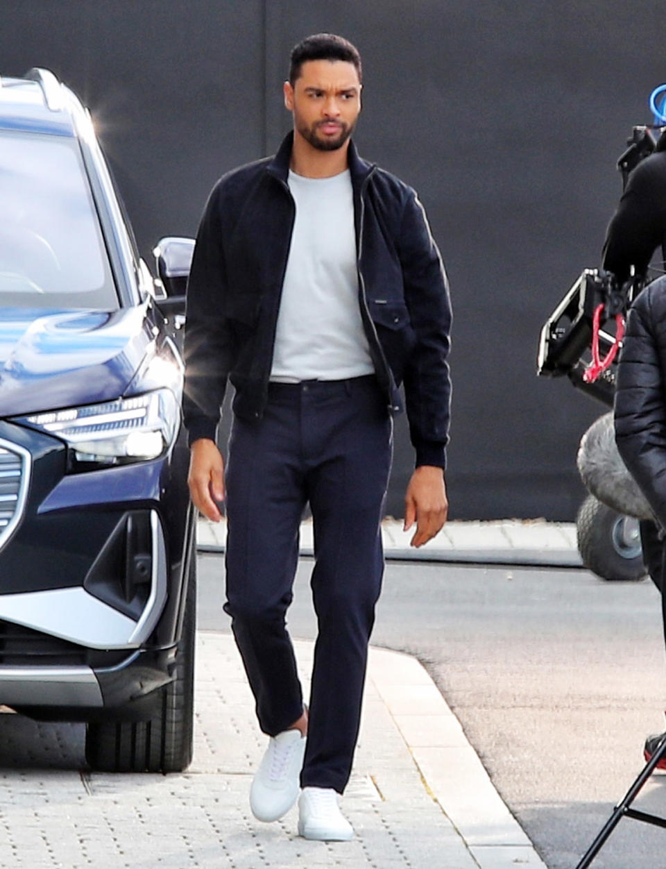 <p><em>Bridgerton</em>'s departed duke, Regé-Jean Page, films an Audi commercial in London over the weekend. </p>