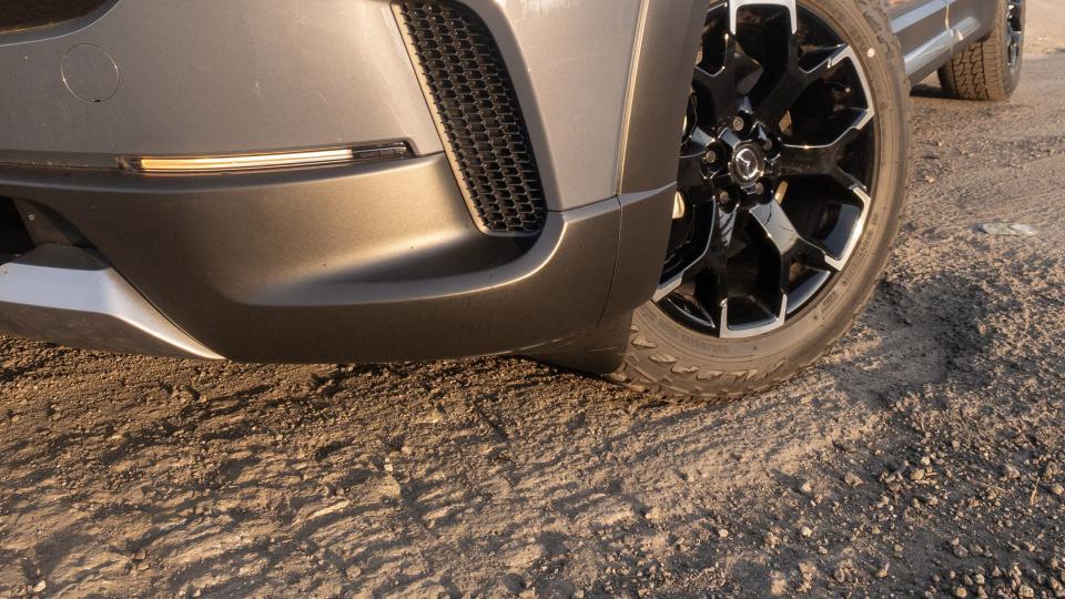 a car parked on a gravel road