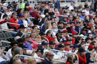 Baseball fans watch a game between the Philadelphia Phillies and the Atlanta Braves, Friday, May 7, 2021, in Atlanta. The Braves opened the stadium to 100% capacity. (AP Photo/John Bazemore)