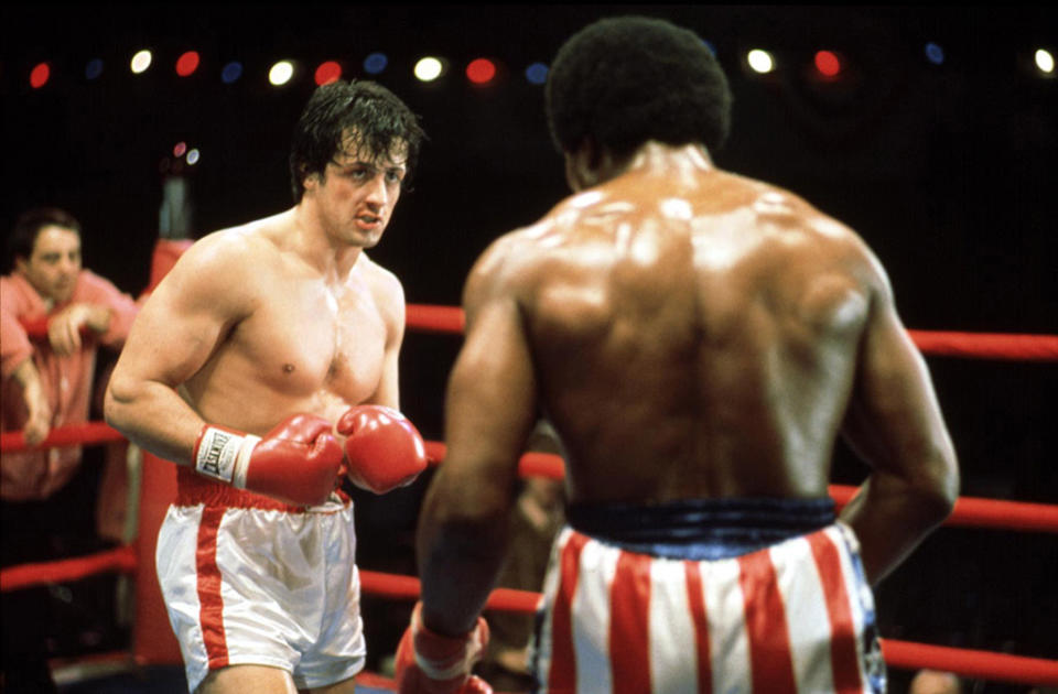 <a href="http://movies.yahoo.com/movie/rocky/" data-ylk="slk:ROCKY;elm:context_link;itc:0;sec:content-canvas" class="link ">ROCKY</a> (1976) <br>Directed by: <span>John Avildsen</span> <br>Starring: <span>Sylvester Stallone</span>, <span>Talia Shire</span> and <span>Burt Young</span>