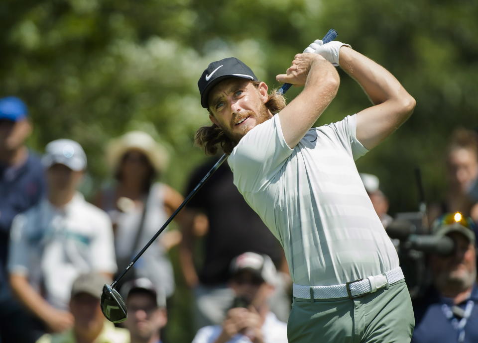 Tommy Fleetwood of England watches his tee shot on the fifth hole during the first round of the the Canadian Open golf tournament at Glen Abbey in Oakville, Ontario, Thursday, July 26, 2018. (Nathan Denette/The Canadian Press via AP)