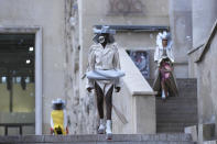 Models wear creations as part of the Rick Owens Ready To Wear Spring-Summer 2020 collection, unveiled during the fashion week, in Paris, Thursday, Sept. 26, 2019. (AP Photo/Michel Euler)