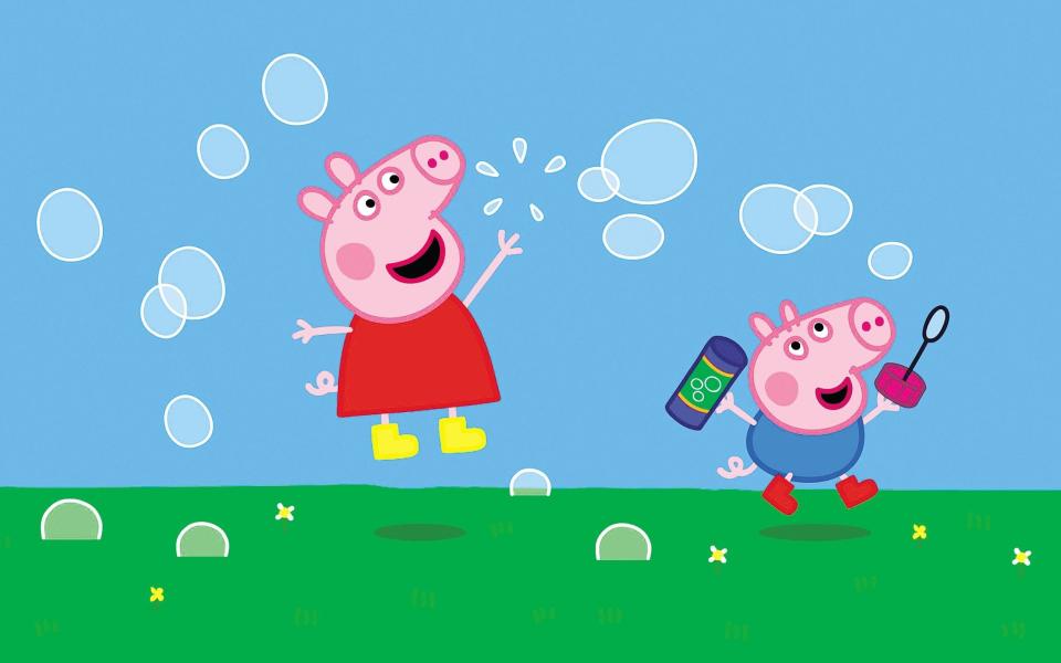 The filmmaker watches <em>Peppa Pig</em> with his son. (Entertainment One)