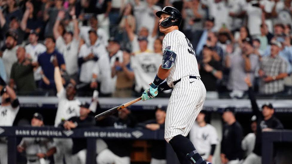 Aaron Judge watches the ball after hitting his 52nd home run of the 2024 season