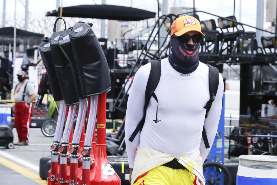 Gas cans for driver Ryan Newman are pulled through the pit area before the NASCAR Cup Series auto race Sunday, May 17, 2020, in Darlington, S.C. (AP Photo/Brynn Anderson)