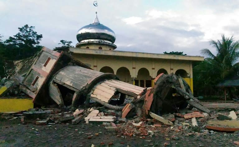 A collapsed mosque minaret is seen after a 6.5-magnitude earthquake struck the town of Pidie, Indonesia's Aceh province in northern Sumatra