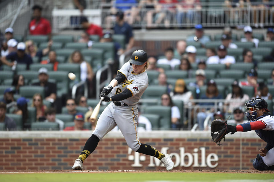 Pittsburgh Pirates' Jack Suwinski flies out to Atlanta Braves left fielder Adam Duvall during the sixth inning of a baseball game Saturday, June 11, 2022, in Atlanta. (AP Photo/Hakim Wright Sr.)