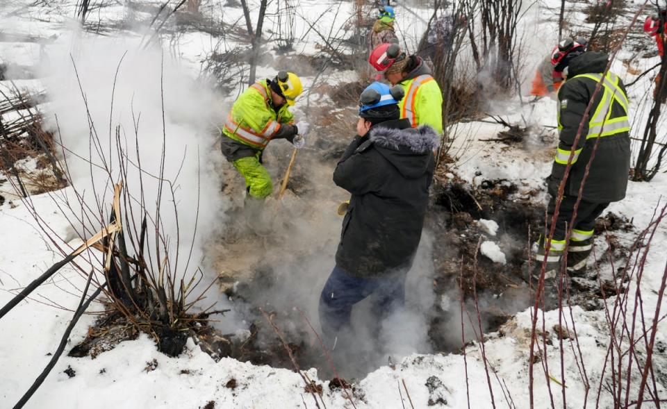 Alberta has declared an early start to wildfire season. Firefighters battle ‘zombie’ fires in Fox Lake that have persisted despite the cold and snow on 6 February (Alberta wildfire/AFP via Getty)