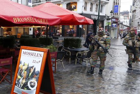 Belgian soldiers patrol nearby Brussels' Grand Place on November 22, 2015, after security was tightened in Belgium following the fatal attacks in Paris. REUTERS/Yves Herman